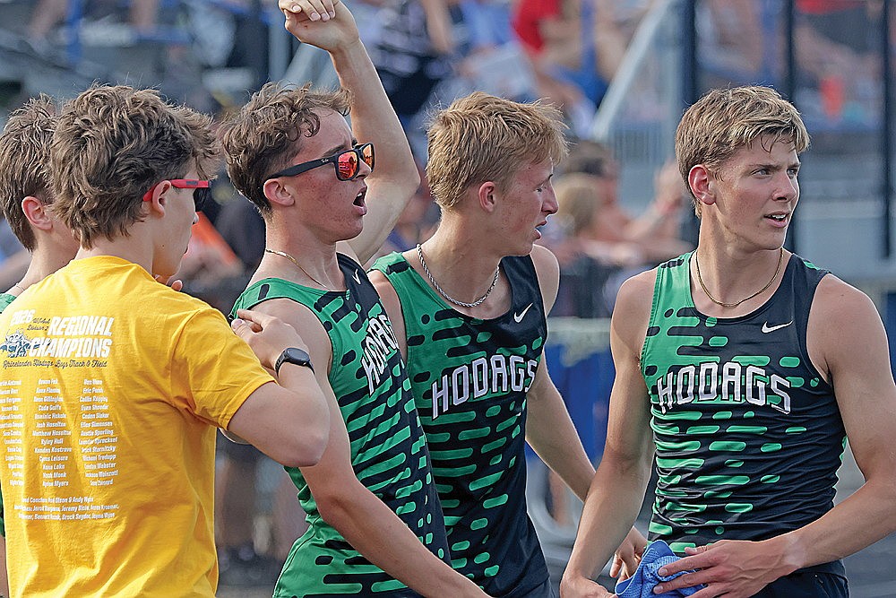 Rhinelander’s Avrom Barr, center, raises his arm in celebration, surrounded by teammates (from left to right), Paul Denis, Wyatt Crowell, Jackson Weinzatl and Dean Gillingham, after the Hodags qualified for the WIAA state meet with a fourth-place finish at a WIAA Division 2 track sectional meet in Rice Lake Friday, May 29. The Hodags sent nine of their 30 sectional entries onto the state meet in La Crosse. (Jeremy Mayo/River News)