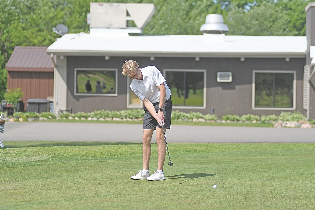 Davis Kock makes a birdie putt on the fifth hole during a WIAA Division 1 sectional meet Tuesday, June 2 at RiverEdge Golf Course in Marshfield. Kock made it to the state meet for the fourth time in his career, first as an individual. (Photo by Brett LaBore/Lakeland Times)