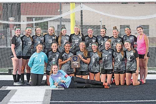The Thunderbirds celebrate their regional championship following a 3-0 victory over Merrill in a WIAA Division 3 regional final game Saturday, June 6 at IncredibleBank Field in Minocqua. Team pictured, back row from left, are Laine Jelinski, Annelise Mayer, Kenzie Blohm, Maddie Hohlweck, Nora Metzger, Kasey Wise, Karsyn Dyre, Addie Hagen, Jaime Jorgensen, Jordyn Durant, manager Jadyn Wentland; middle row, Emma Bergquist, Bella Peterson, Tayiah Bauman, Molly Jorgensen, Malin Awker, Lexi Gindorff, Katy Janowiec, Kaylee Erdmann; front row, Ava Evenhouse. (Photo by Brett LaBore/Lakeland Times)