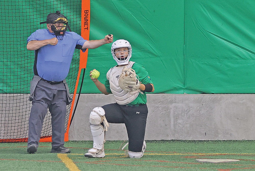 Rhinelander’s Saige Mutter reacts after catching the final strike of the Lady Rebels’ 8-7 victory over the Shawano Hawks in an American Legion softball game at the Hodag Dome Tuesday, June 16. Rhinelander won it its Legion softball debut. (Bob Mainhardt for the River News)