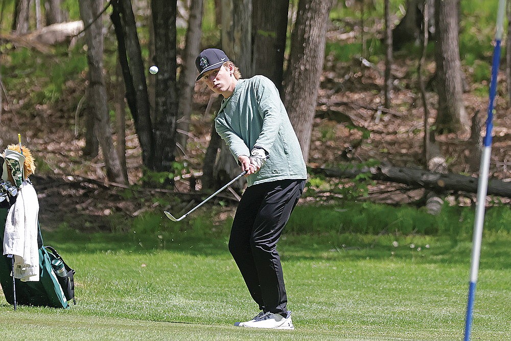 In this May 21, 2026 file photo, Rhinelander’s Grant Gremban chips onto the green of the par-3 third hole during the Hodag Invite golf meet at Northwood Golf Club. Gremban led the Hodags in scoring average this spring, averaging 83.14 strokes per round. (Jeremy Mayo/River News)