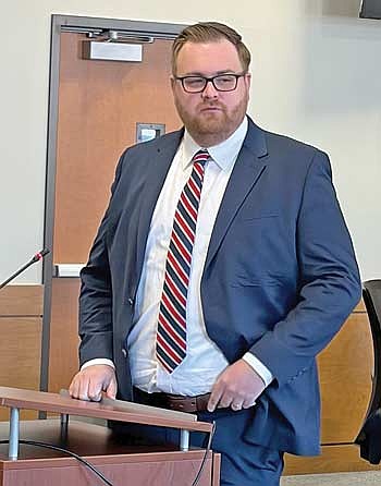 Joshua Crownover, Vilas County’s newly appointed corporation counsel, at the podium during Tuesday’s county board meeting. (Photo by Brian Jopek/Lakeland Times)