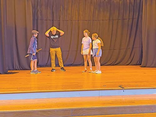 Students — sixth grader Xavier Daubon, eighth grader Bruce Istuder, seventh grader Rilee McCoy and sixth grader Brantlee Snow — perform a skit featuring their original characters during the Summer Youth Theater skills camp at the Campanile Center for the Arts on Thursday, June 18, in Minocqua. (Photo by Brian Jopek/Lakeland Times)