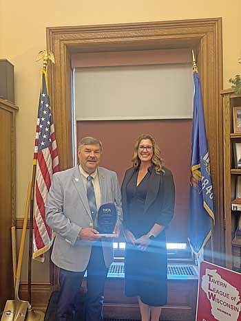 Representative Rob Swearingen was recognized with a WCA Outstanding Legislator Award on June 23. Also pictured is WCA Government Affairs Associate Marcie Rainbolt. (Contributed photograph)