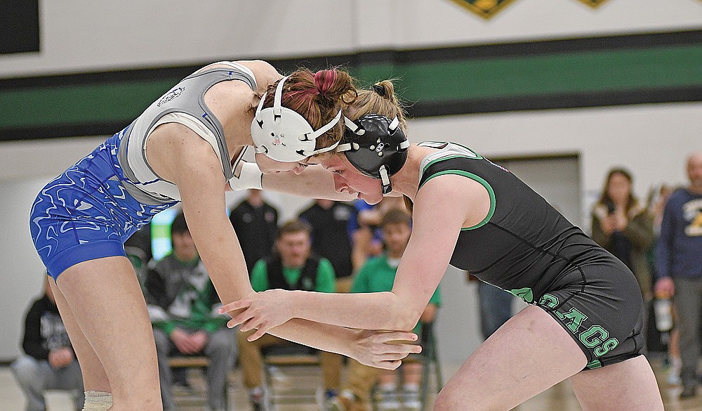 In this Feb. 20, 2026 file photo, Rhinelander’s Cassidy Lindner, right, grapples with Bay Port’s Dakotah Athey during a WIAA girls’ wrestling sectional tournament at D.C. Everest High School in Weston. Lindner will serve as the lead clinician for the Hodag Girls’ Wrestling Camp, a free camp open to girls age 4-18, at James Williams Middle School Monday, Aug. 3. (Brett LaBore/Lakeland Times)