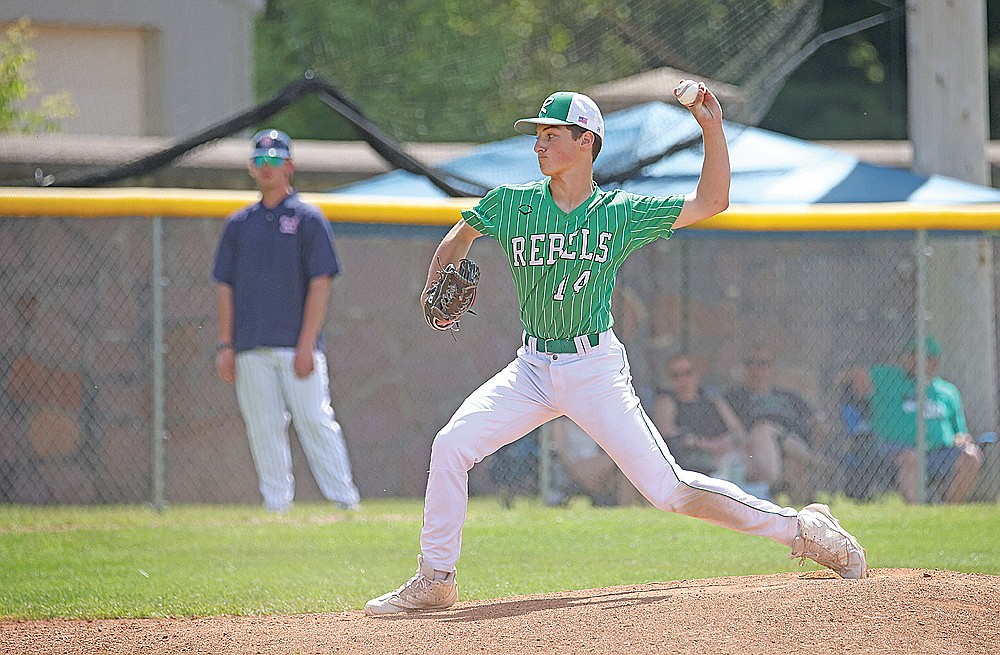 Rhinelander’s Blake Bauer rifles a pitch during a Legion game against Merrill at Athletic Park in Merrill Saturday, June 27. (Blake Richard/River News)