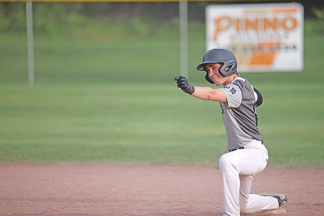 Minocqua’s Landon Grey-Ives celebrates a two-run double in the fourth inning of a Legion game against Tomahawk at the Minocqua Park Complex in Minocqua on July 7. Grey-Ives was 1-for-3 with two RBIs in the game.
(Photo by Blake Richard/River News)