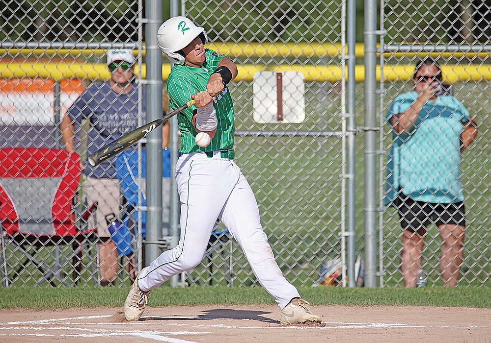 Rhinelander’s Josh Willoughby singles during the first inning of an American Legion baseball game against the Minocqua 89ers in Minocqua Monday, July 6. Willoughby was one of six Rebels to collect two hits in the game as Rhinelander defeated Minocqua, 12-5. (Blake Richard/River News)