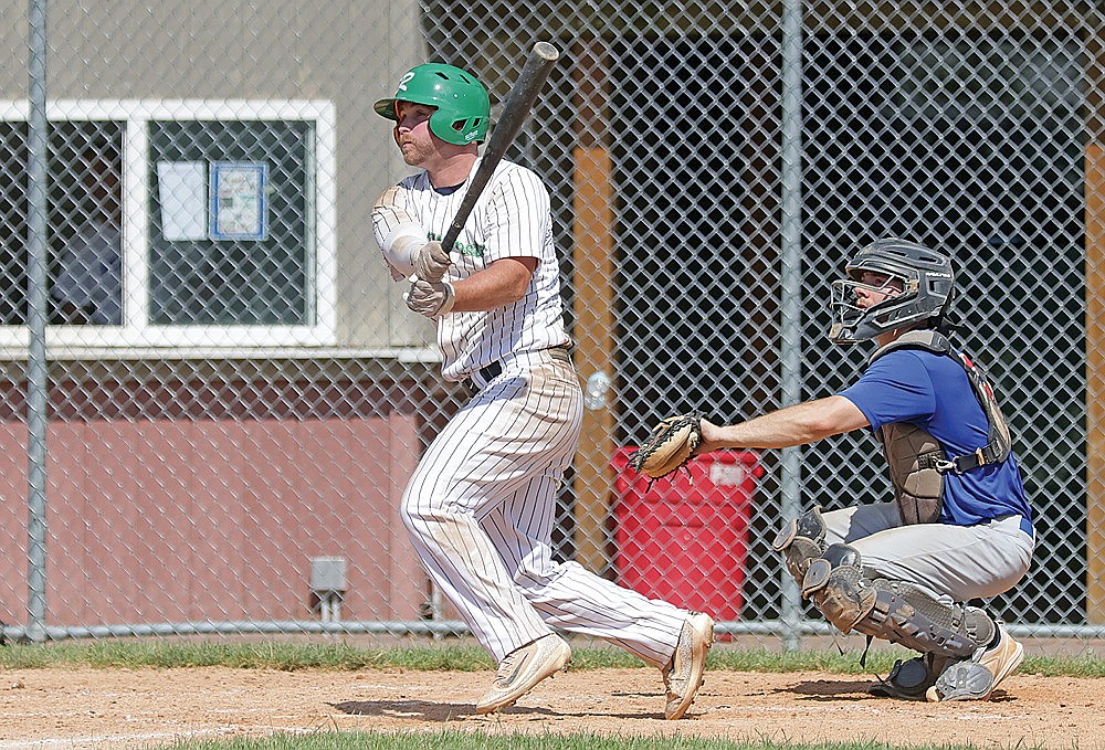 Rhinelander’s Easton Senoraske hits a double during the seventh inning of a Dairyland League baseball game against the Merrill Rangers in Merrill Sunday, July 5. Senoraske went 4-for-5, including a go-ahead two-run double in the ninth, as the River Monsters defeated the Rangers, 11-8. (Jeremy Mayo/River News)