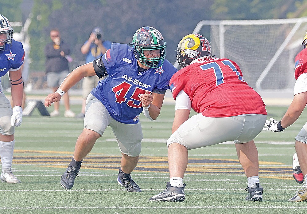 Rhinelander’s Caden Sieker rushes against Franklin’s Henry Vallee during the second quarter of the WFCA Large School All-Star Game in Oshkosh Saturday, July 18. (Jeremy Mayo/River News)