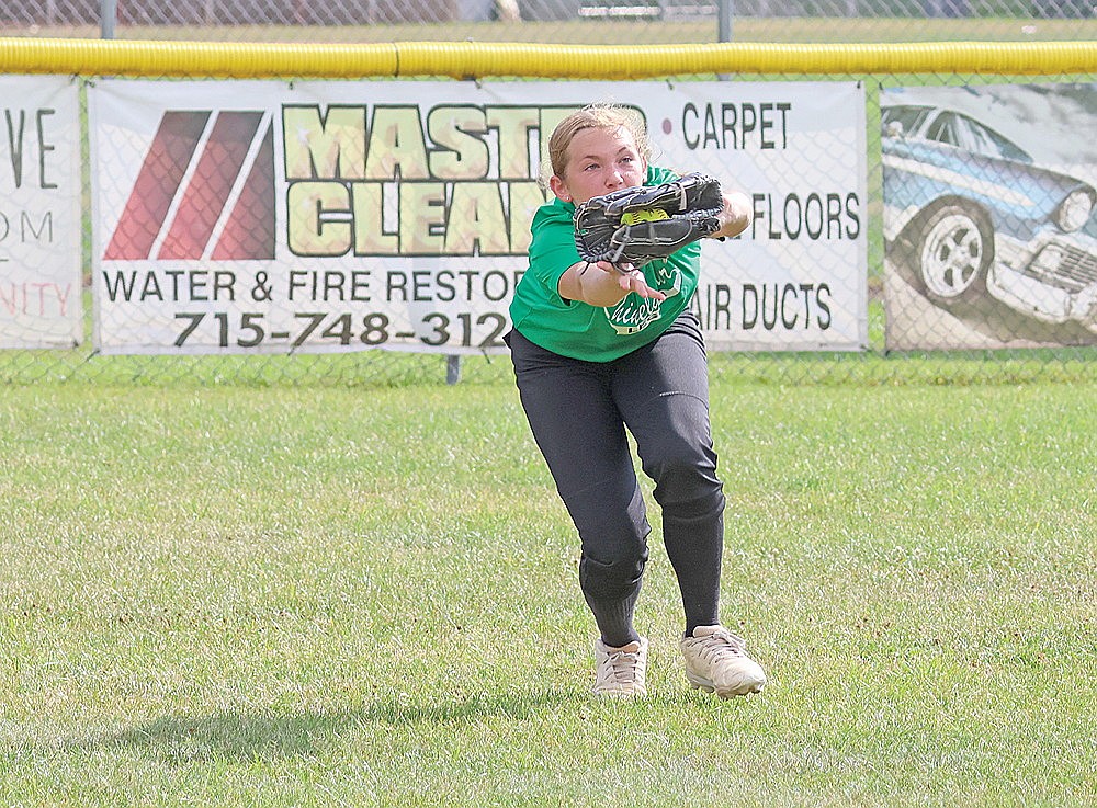 Rhinelander’s Kalyn Miller catches a line drive during the fourth inning of an American Legion Softball regional tournament game against Medford in Medford Monday, July 20. The Lady Rebels’ season ended with a 13-3 loss to Medford and a 13-5 loss to Edgar on Monday. (Matt Frey/Star News)