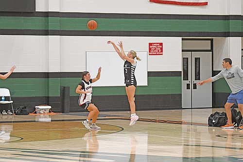 Hailey Carlson makes a 3-pointer in the second half of a summer league game against Crandon Tuesday, July 21 at D.C. Everest Senior High School in Weston. Carlson had a team-high 17 points and four 3-pointers. (Photo by Brett LaBore/Lakeland Times)