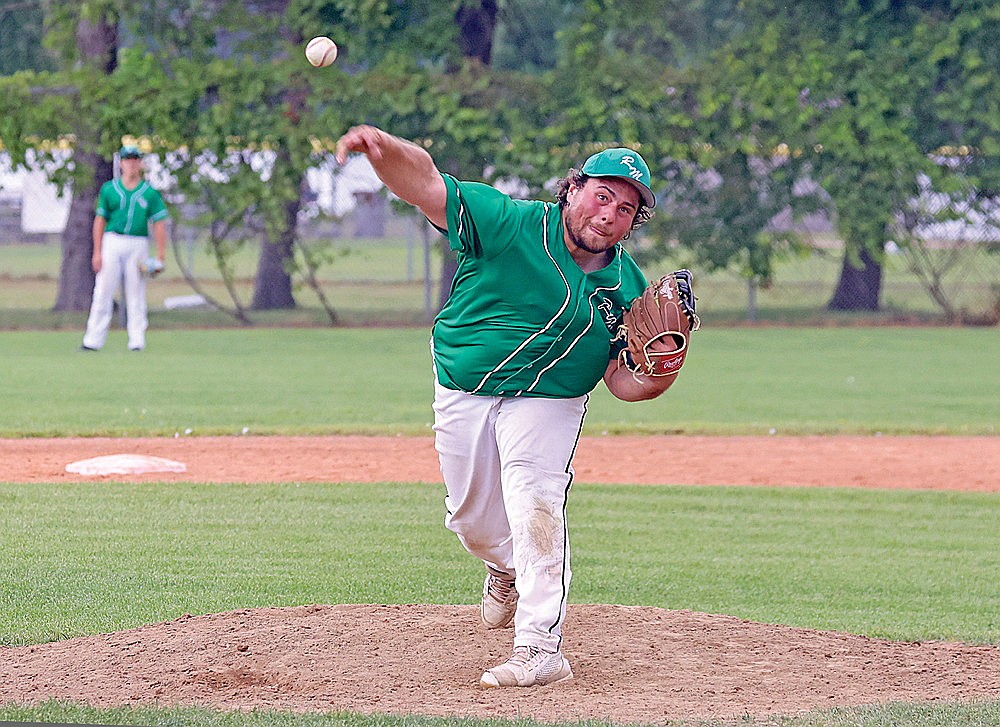 Rhinelander’s Austin Reckow pitches during the seventh inning of a Dairyland League baseball game against the Everest Merchants at Stafford Field Saturday, July 25. Reckow, making his pitching debut for the River Monsters, needed just five pitches to record a 1-2-3 inning. (Bob Mainhardt for the River News)