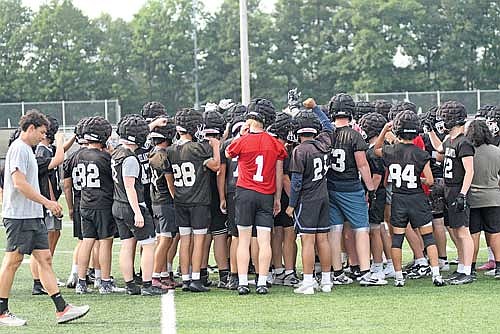 The Lakeland Union High School football team gathers for the first practice of the season Tuesday, Aug. 4 at IncredibleBank Field in Minocqua. (Photo by Brett LaBore/Lakeland Times)
