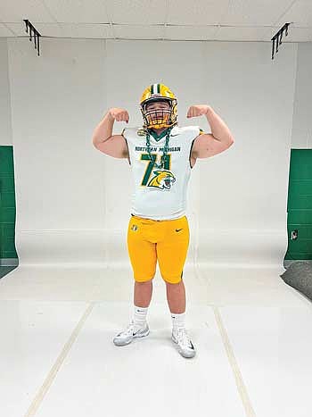 Aidan Bauers committed to play football for Northern Michigan University June 29. (Contributed photograph)