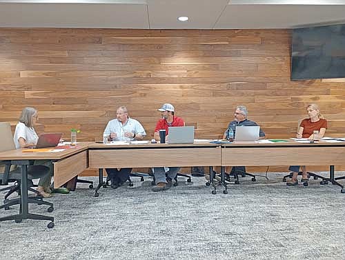 Discussing ideas for a possible discretionary merit program for Newbold employees are (l-r) town supervisors Petra Pietrzak, Mike McKenzie, Scott Ridderbusch, chairman Dan Hess, and clerk Kim Gauthier at the Aug. 13 Newbold town board meeting. (Photo by Ardith Carlton/River News)