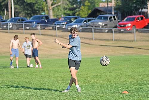 Ira Slemmons goes through a drill on the first day of the season Monday, Aug. 17 at Lakeland Union High School in Minocqua. (Photo by Brett LaBore/Lakeland Times)