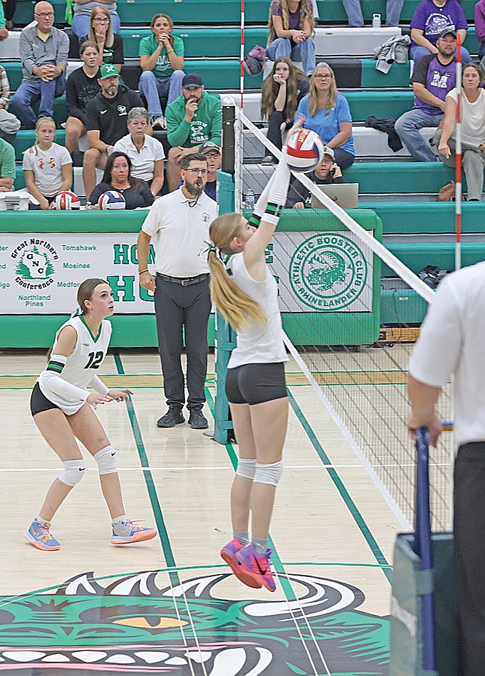 Rhinelander’s Mady Treder blocks Mosinee’s Pacyn Stoffel in the first set of a GNC match against Mosinee in Jim Miazga Community Gymnasium Spet. 29. Treder had two blocks in the 25-7, 25-7, 25-15 loss.