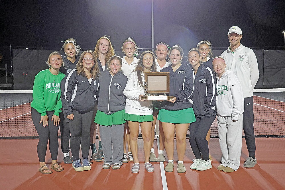 The Rhinelander High School girls’ tennis team poses with the Great Northern Conference championship trophy after winning the conference tournament in Wausau Thursday, Oct. 1. Pictured in the front row, from left to right, are assistant coach Tori Riopel, Katelyn Piller, Addy Strobel, Lucy Evers, Taylor McKinney, Annie Vander Galien and Jordan Manske. In the back row are Sam Aschenbrenner, Alexia Corey-Luse, Addy Currie, Mya Gillen, Paige Wanta and head coach Matt Nichols. It is Rhinelander’s first conference title in girls’ tennis since 2022.