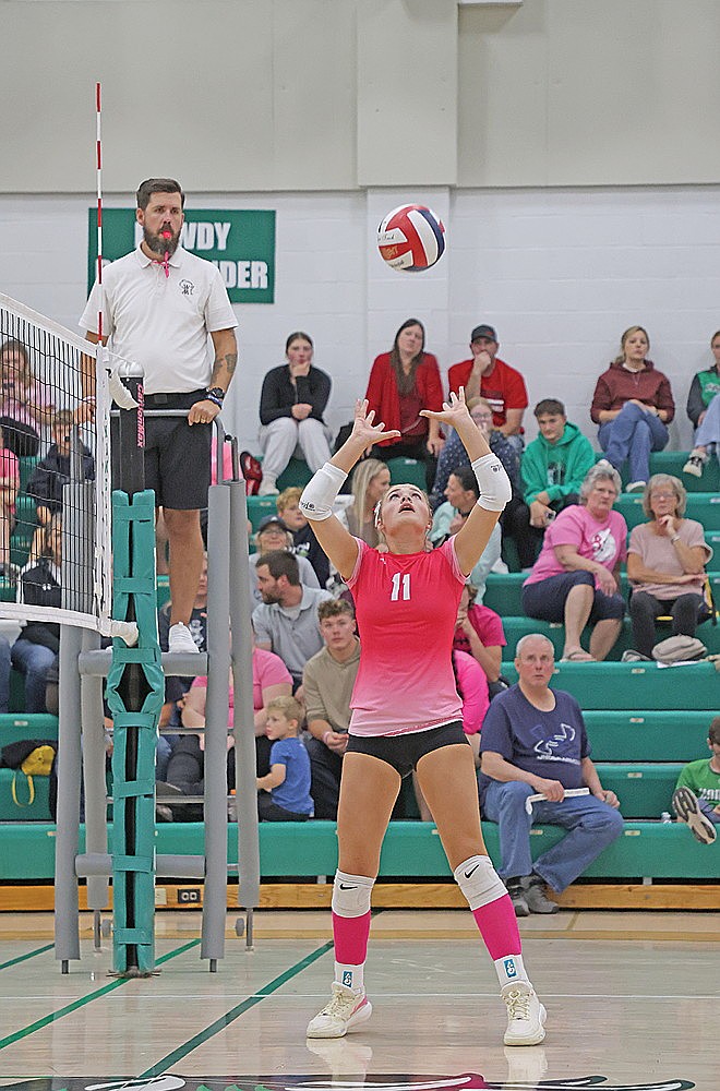 Rhinelander’s Addy Wiczek sets the ball during a GNC match against Medford in Jim Miazga Community Gymnasium Oct. 6.