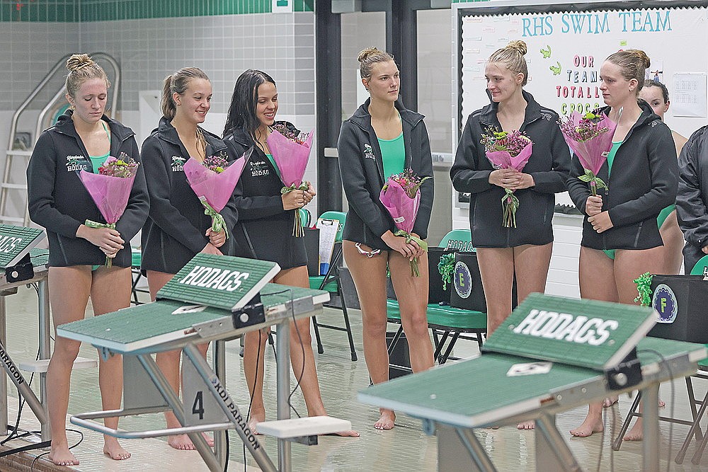 Seniors on the Rhinelander High School girls’ swim team, from left, Vivian Lamers, June Chiamulera, Francesca Paolini, Ella Heck, Kiley Pooch and Rylee Mickevicius, are honored during intermission of a GNC dual meet against Mosinee at the Heck Family Community Pool Thursday, Oct. 8. The sextet, in their final home meet, were responsible for 10 of the Hodags’ 11 wins in a 136-29 victory over Mosinee.