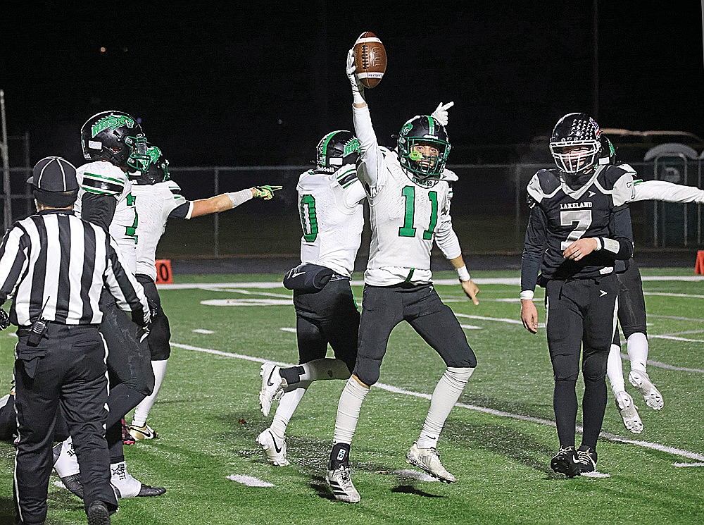 Rhinelander’s Chase West celebrates after recovering a fumble during the fourth quarter of the Northwoods Axe Game against Lakeland in Minocqua Friday, Oct. 17. The fumble led to a go-ahead touchdown from Matthew Haselton as the Hodags scored three touchdowns in the final 4 1/2 minutes of regulation to defeat Lakeland, 27-14.