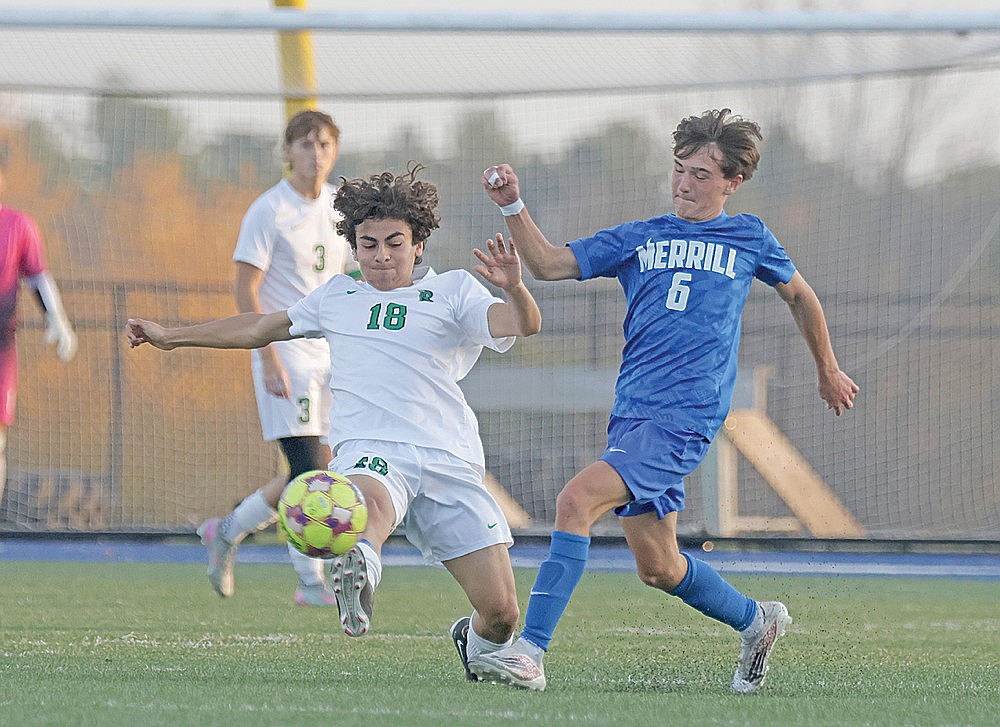 Rhinelander’s Santiago Rodriguez Martinez sends a shot upfield against Merrill’s Max Westover during the first half of a WIAA D3 boys’ soccer regional semifinal game in Merrill Thursday, Oct. 22. (Jeremy Mayo/River News)