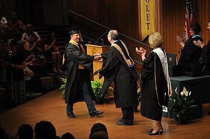 A flip of the tassel!