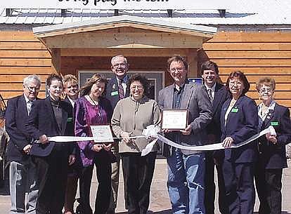 FACTORY OUTLET OPENS--Rhinelander area Ambassadors celebrated the opening of Factory Outlet on Chippewa Drive with a ribbon-cutting ceremony. The spacious outlet store offers a new inventory every week and a diverse selection of factory specials. Shown, from left, are Gordon Waldvogel, Stacy Bowman, Diane Sowinski, Joi Shoeder, Charlie Moser, Jill Bradley, Mike Shoeder, John Roberts, Sue Vanzo and Judy Seifert. (Daily News by Jan Juedes)