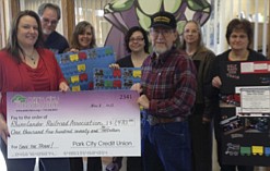 Park City Credit Union donates to 'Save the Train'
