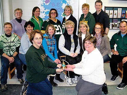 School district staff rings bells to charitable victory