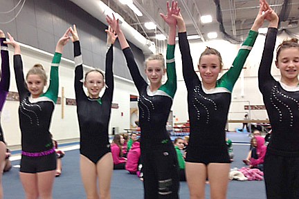 JWMS gymnasts win quad at Marshfield