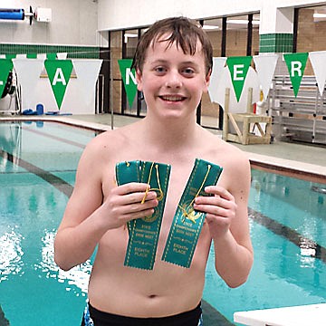 Russell Benoy competes at state swim meet 