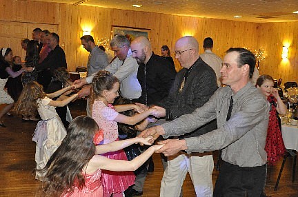 Fathers and daughters bond at YMCA dance