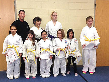 Photo: Martial artists receive belts