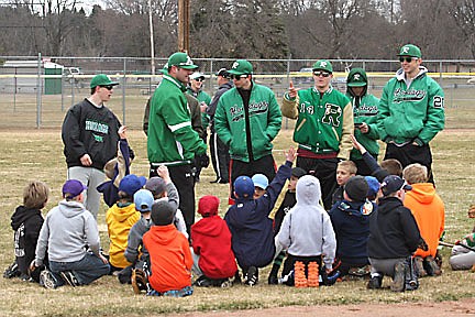 RHS baseball team works with young players at clinic