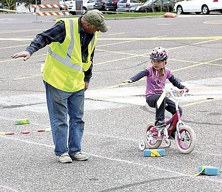 Children learn safety tips at annual bike rodeo