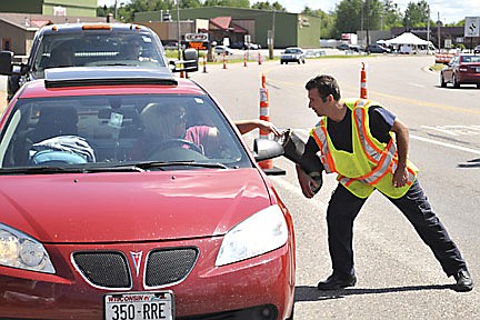 Rhinelander firefighters fill the boot for MDA