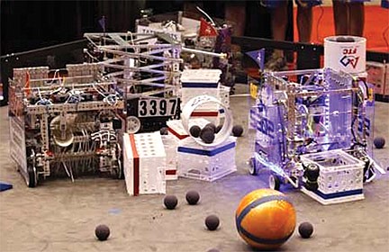 The 2014 Rhinelander First Tech Challenge Robotics Team receives a $1,000 grant from the WPS Innovative Educator Program