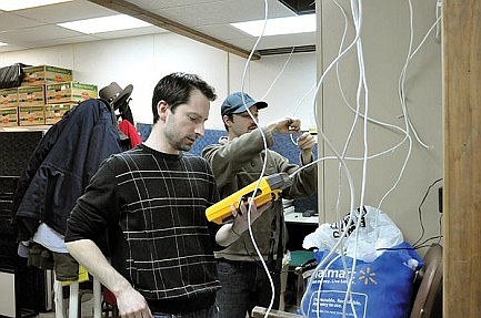 Nicolet students install new software at food pantry