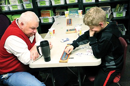 Central Intermediate School students practice math, problem solving at holiday Cribbage party