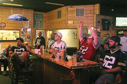 Fans poised to cheer on Green Bay in playoffs