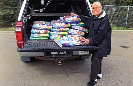 Photo: Friends of animal shelter donate to food pantry