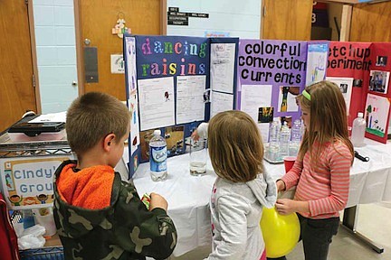 Little scientists show off experiments during CHAMPS science fair