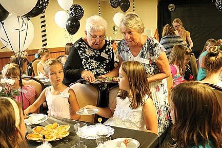 Photos: Rhinelander District Library hosts tea party, superhero Jeopardy