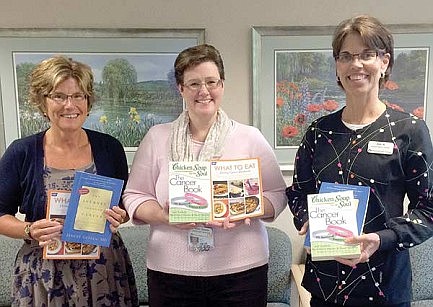 MTH Foundation gift supports books for Marshfield Clinic cancer care patients