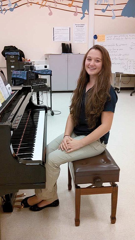RHS student Faith Bartelt sings with WSMA Honors Choir