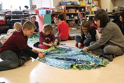 NCES students make blankets, write letters for Rennes residents