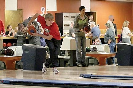 Bowlers honor fallen officer, raise funds for scholarship