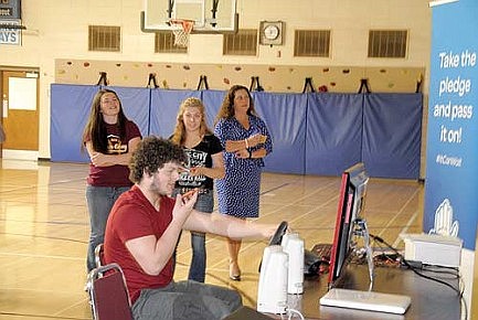 It can wait:  Simulator teaches Three Lakes  students to keep their eyes on the road  